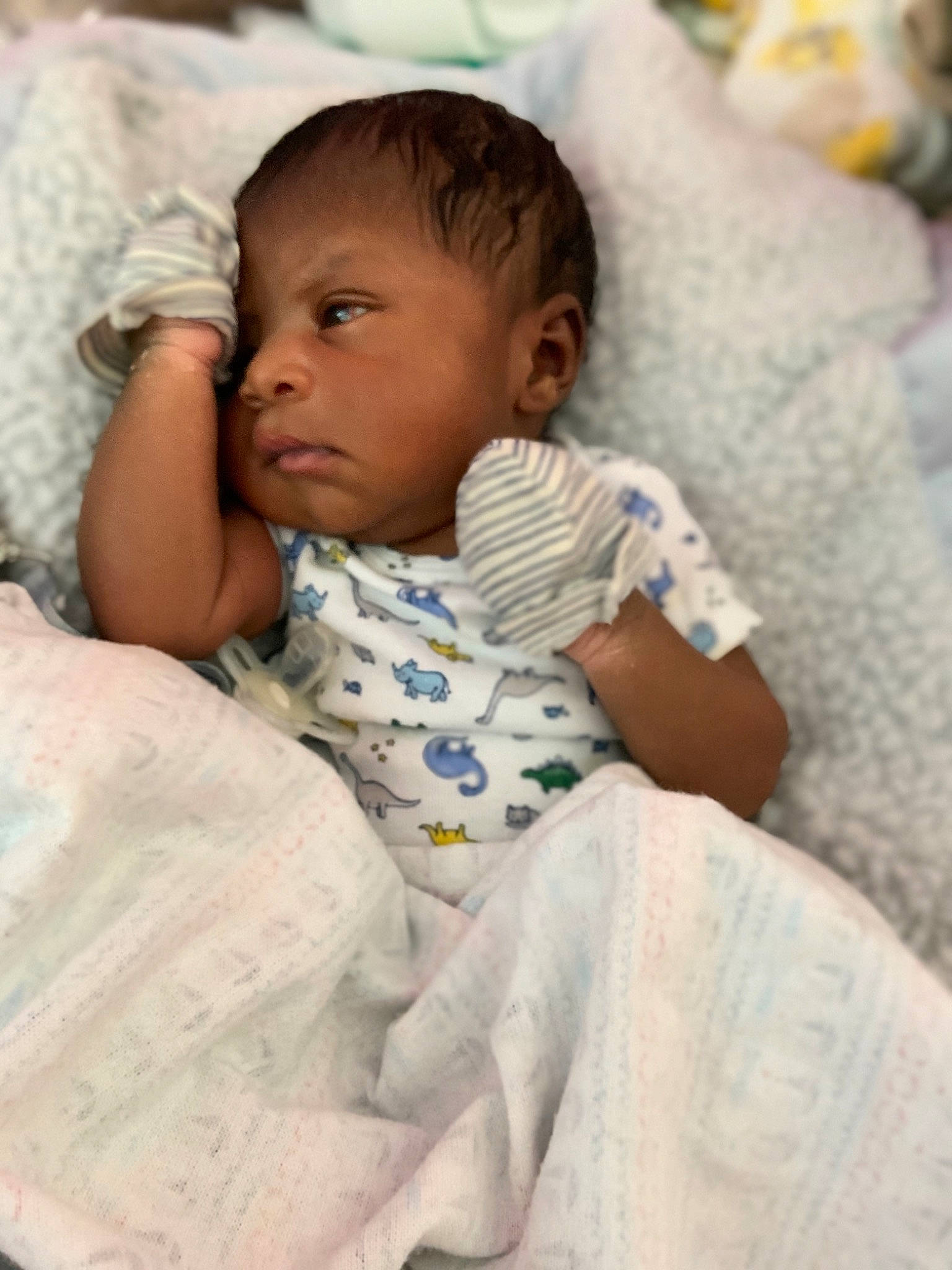 Jaxsen is registered to the contest to win money with this photo: baby, bedtime, birth, blanket, cheek, child, comfort, eye, linens, nose, person, skin, sleep, smile, toddler