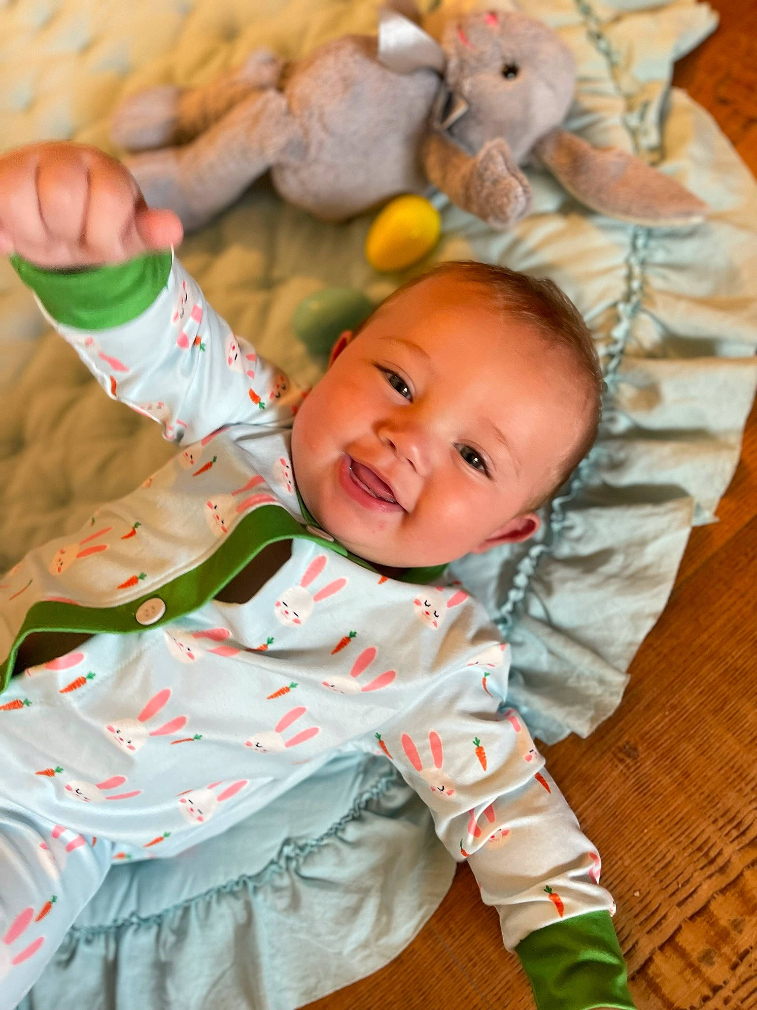 Davis joined the competition — help win amazing prizes! baby, baby_toddler_clothing, cheek, child, comfort, eye, fun, grass, happy, head, nose, orange, people_in_nature, person, sitting, skin, sleeve, smile, toddler, toy