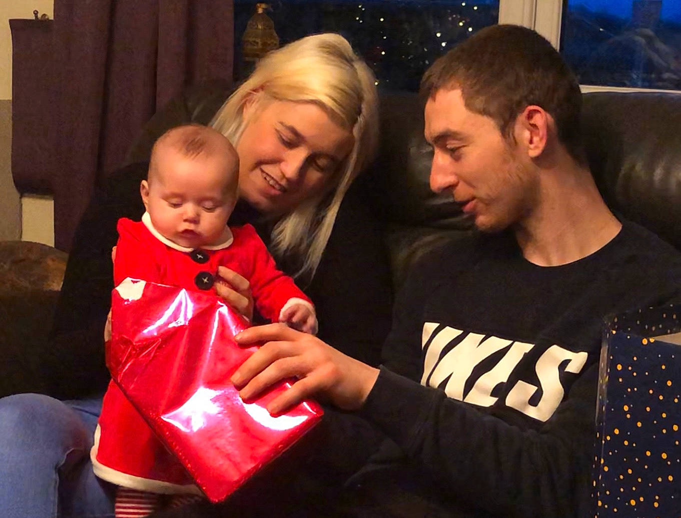 Hayleigh is registered to the contest to win money with this photo: child, christmas_eve, event, family, father, joy, people, person, t_shirt, toddler