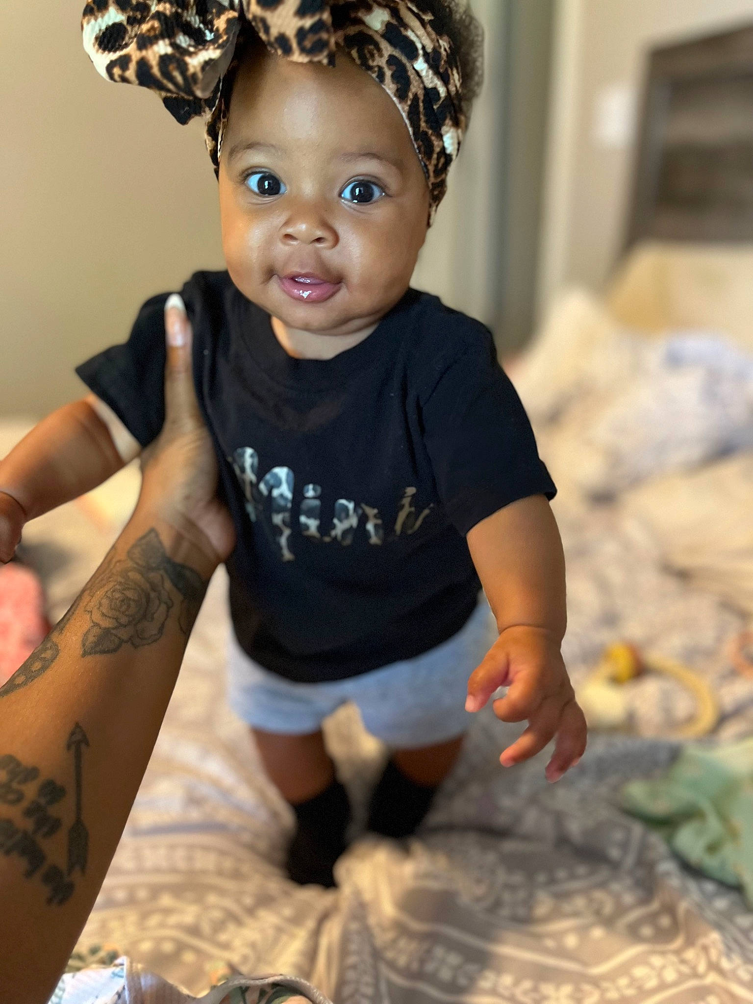 Kolbee is registered to the contest to win money with this photo: baby_toddler_clothing, chin, cool, elbow, eye, eyelash, flash_photography, hairstyle, happy, head, headband, headpiece, human_leg, jewellery, neck, person, skin, sleeve, thigh, toddler