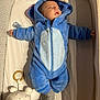 baby, sleeping, onesie, blue, crib, pacifier, soft_toy, plush, infant, cozy, child, cute, toddler, sleep, bed, blanket, toy, comfort, pajamas, rest