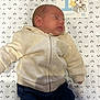 Alessio a rejoint le concours — aidez-le/la à gagner de superbes lots ! baby, sleeping, hoodie, pants, blanket, panda_pattern, milestone_card, cartoon, bunny, rainbow, infant, child, cute, peaceful, indoors, soft_lighting, foot, hand, face, clothing