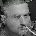 Mark L.