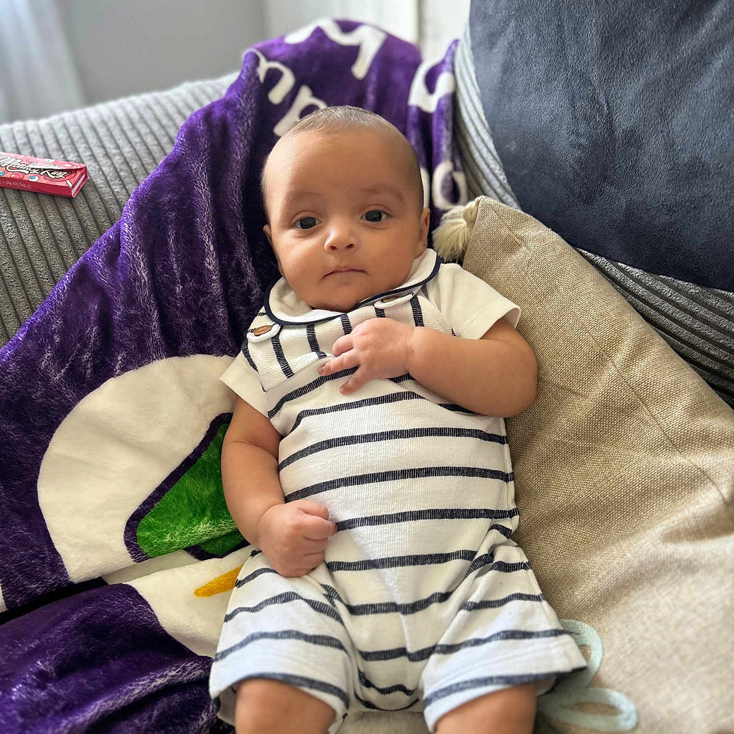 Demi And Arlo joined the competition — help win amazing prizes! baby, blanket, bodypart, clothing, couch, cushion, face, finger, furniture, hand, head, homedecor, indoors, linen, people, person, photography, portrait, shorts, sitting