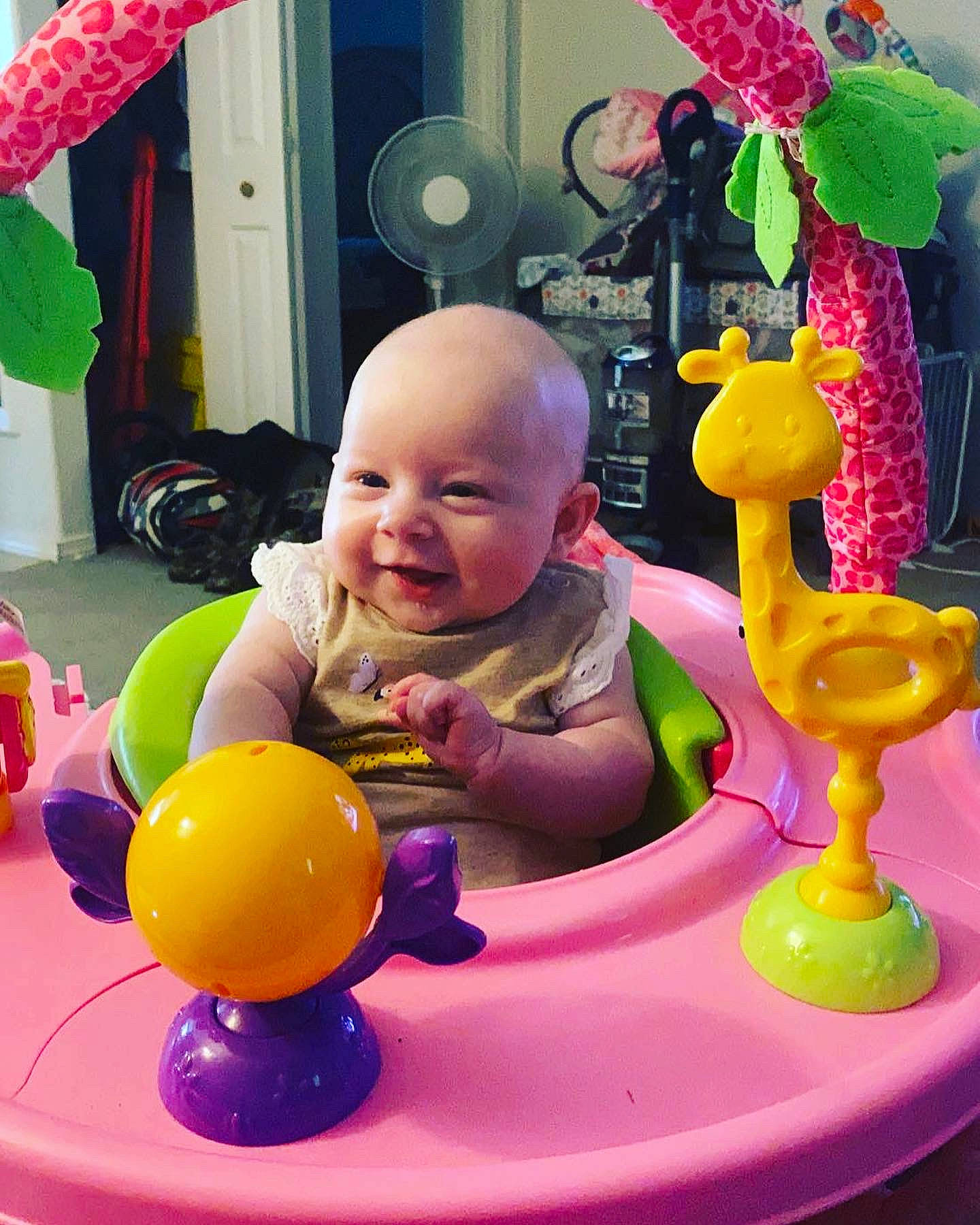 Kaycee is registered to the contest to win money with this photo: baby, baby_playing_with_toys, baby_products, baby_toys, child, event, fun, green, leisure, person, photograph, pink, play, product, purple, red, smile, snapshot, toddler, toy