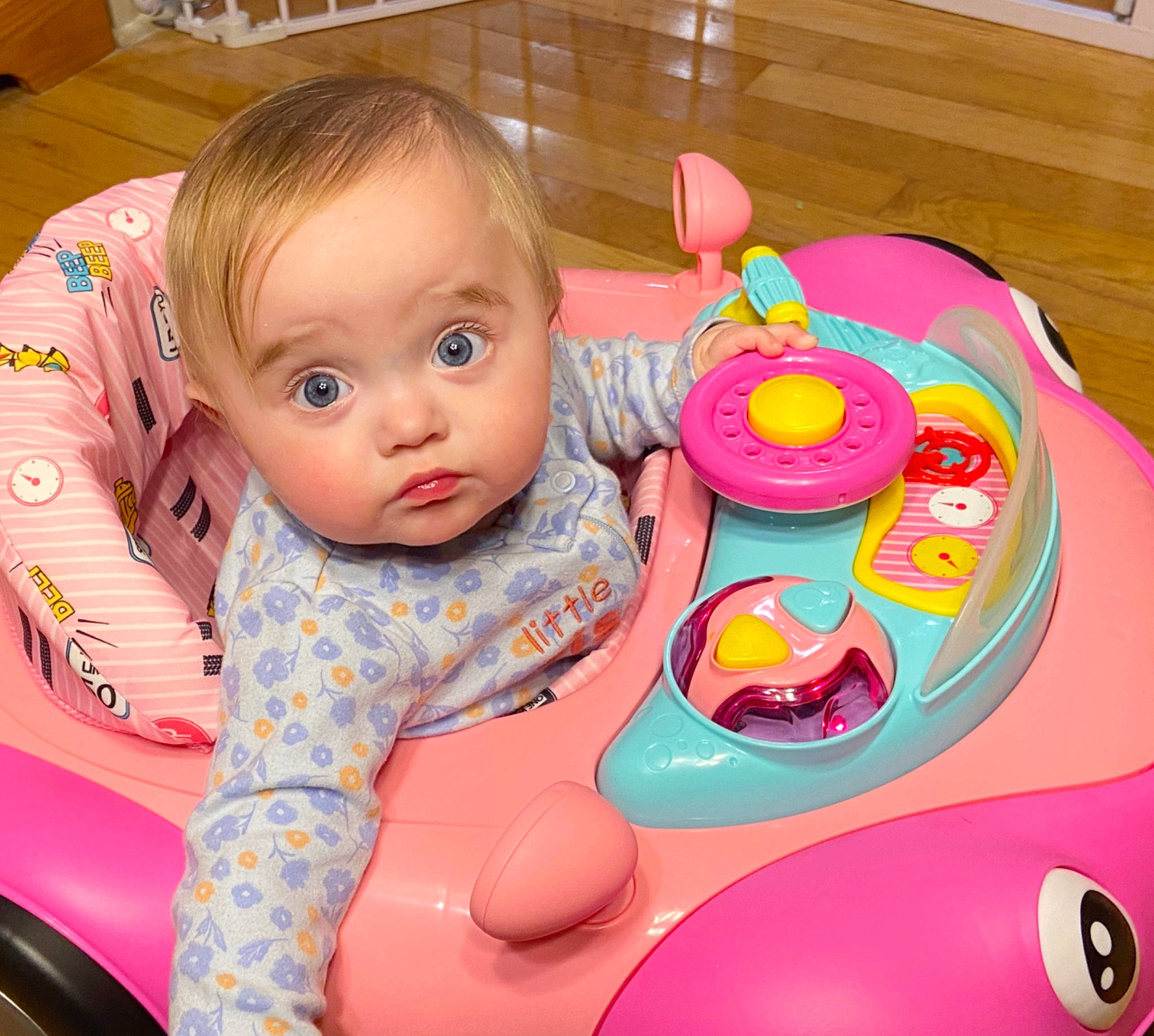 Koa joined the competition — help win amazing prizes! baby, baby_playing_with_toys, baby_products, baby_toddler_clothing, baby_toys, cheek, child, facial_expression, fun, happy, people, person, pink, plastic, play, product, riding_toy, sitting, skin, toddler