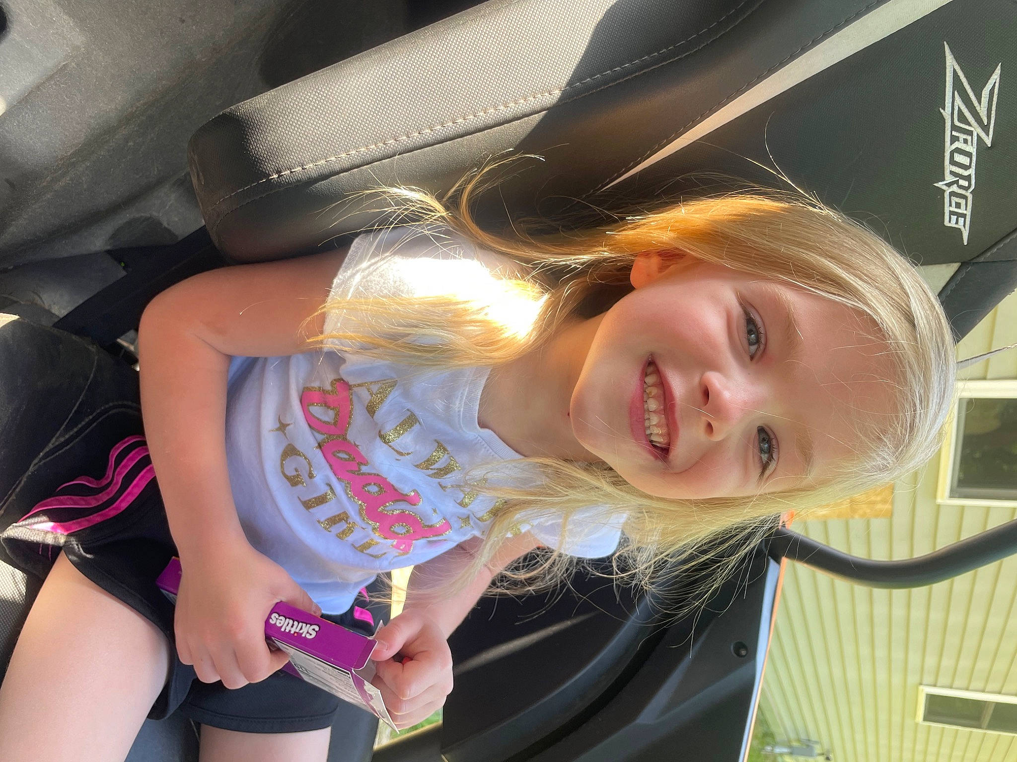 Jae-lynn joined the competition — help win amazing prizes! auto_part, automotive_design, automotive_exterior, blond, child, facial_expression, family_car, fun, happy, human_leg, joy, leisure, luxury_vehicle, motor_vehicle, mouth, person, skin, smile, thigh, toddler