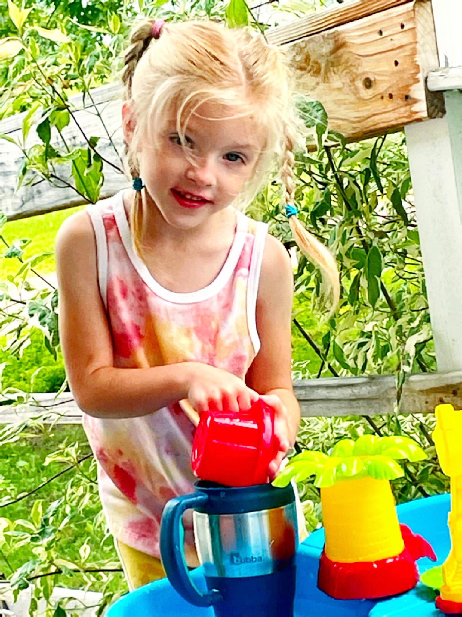 Jae-lynn is registered to the contest to win money with this photo: active_tank, baby_toddler_clothing, blue, child, fun, grass, green, happy, leisure, people_in_nature, person, photograph, plant, plastic, play, sleeveless_shirt, smile, summer, t_shirt, toddler