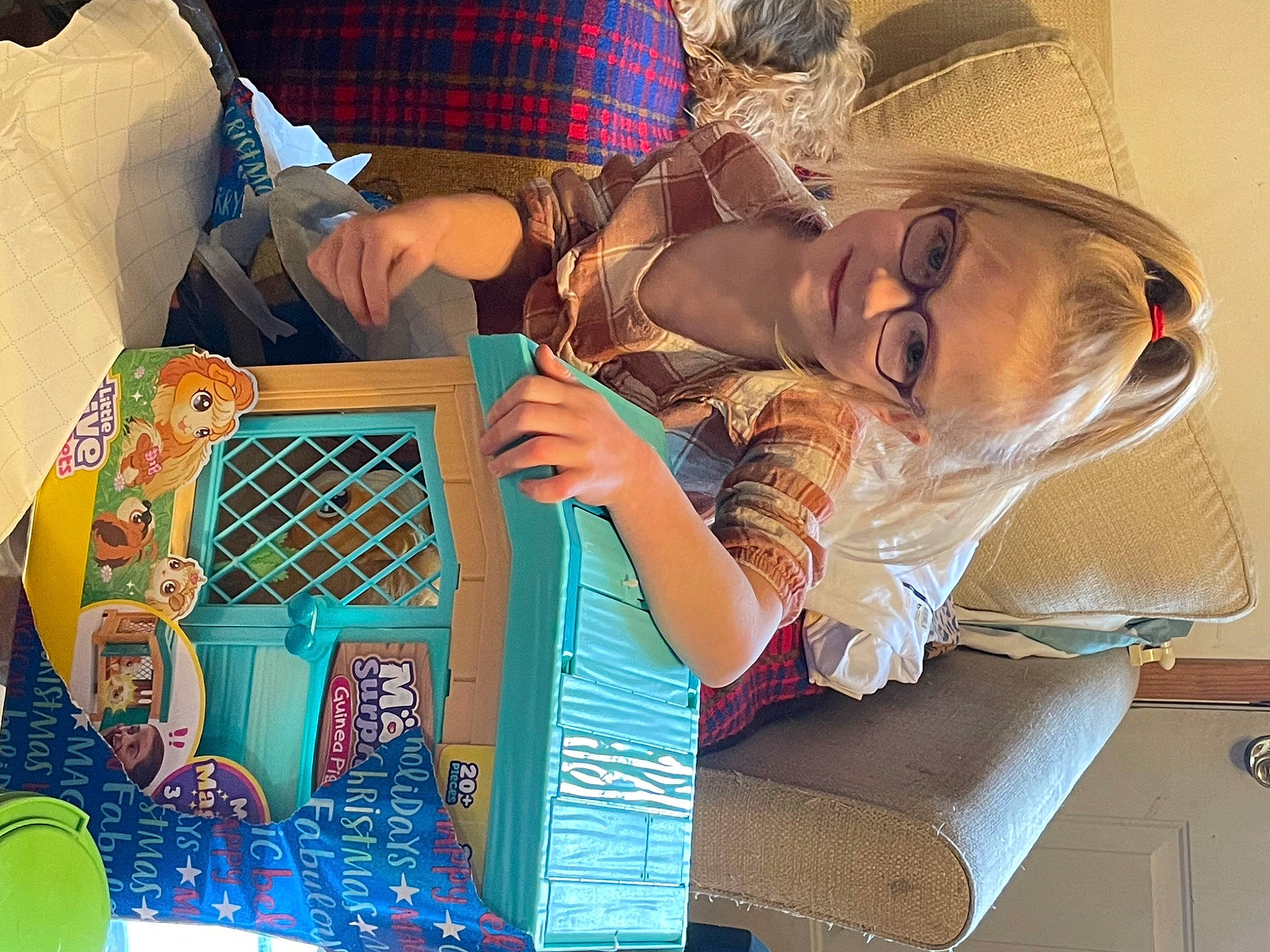 Jae-lynn is registered to the contest to win money with this photo: art, child, eyewear, fedora, fun, hat, joy, leisure, linens, pattern, person, plaid, play, recreation, room, sun_hat, sunglasses, tartan, textile, toddler