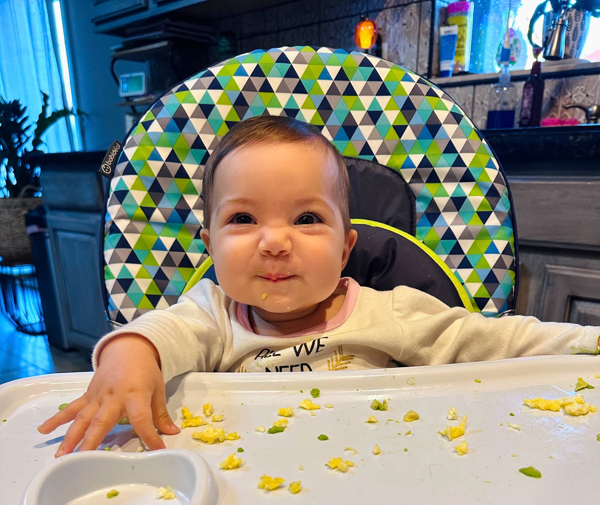 Juliette joined the competition — help win amazing prizes! art, baby, baby_toddler_clothing, bib, chair, cheek, child, facial_expression, fun, happy, houseplant, person, plant, plate, sharing, sitting, smile, table, tableware, toddler