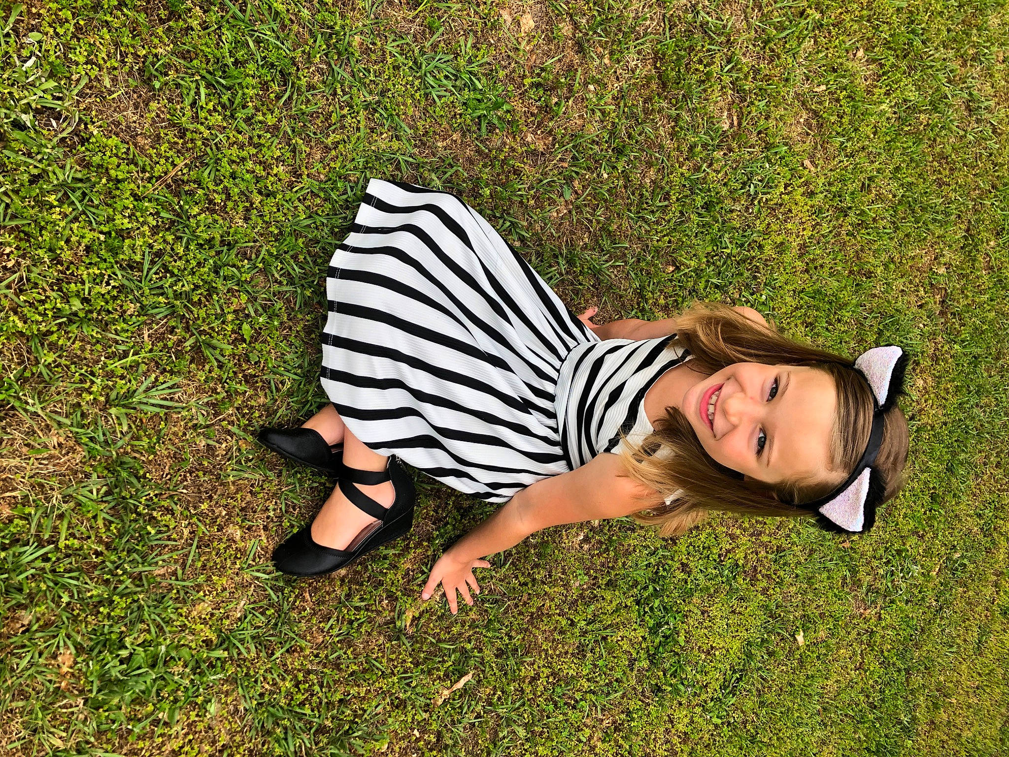 Ava Jean is registered to the contest to win money with this photo: beauty, dress, grass, grass_family, grassland, green, happy, joy, lawn, leaf, leg, leisure, long_hair, meadow, people_in_nature, person, photo_shoot, photography, plant, smile