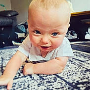 Malakye joined the competition — help win amazing prizes! arm, baby, blue_eyes, carpet, child, clothing, crawling, curious, cute, face, head, home, indoor, infant, living_room, person, rug, skin, smiling, toddler