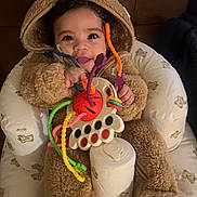 Luisgerardo joined the competition — help win amazing prizes! baby, blanket, cap, clothing, coat, costume, couch, cream, cushion, dessert, face, furniture, hat, head, homedecor, jacket, person, photography, portrait, toy