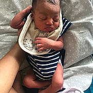 Lj joined the competition — help win amazing prizes! newborn, baby, infant, sleeping, hand, blanket, striped_clothing, bib, skin, person, resting, cute, toddler, soft_texture, indoors, closeup, human, sleep, care, tenderness