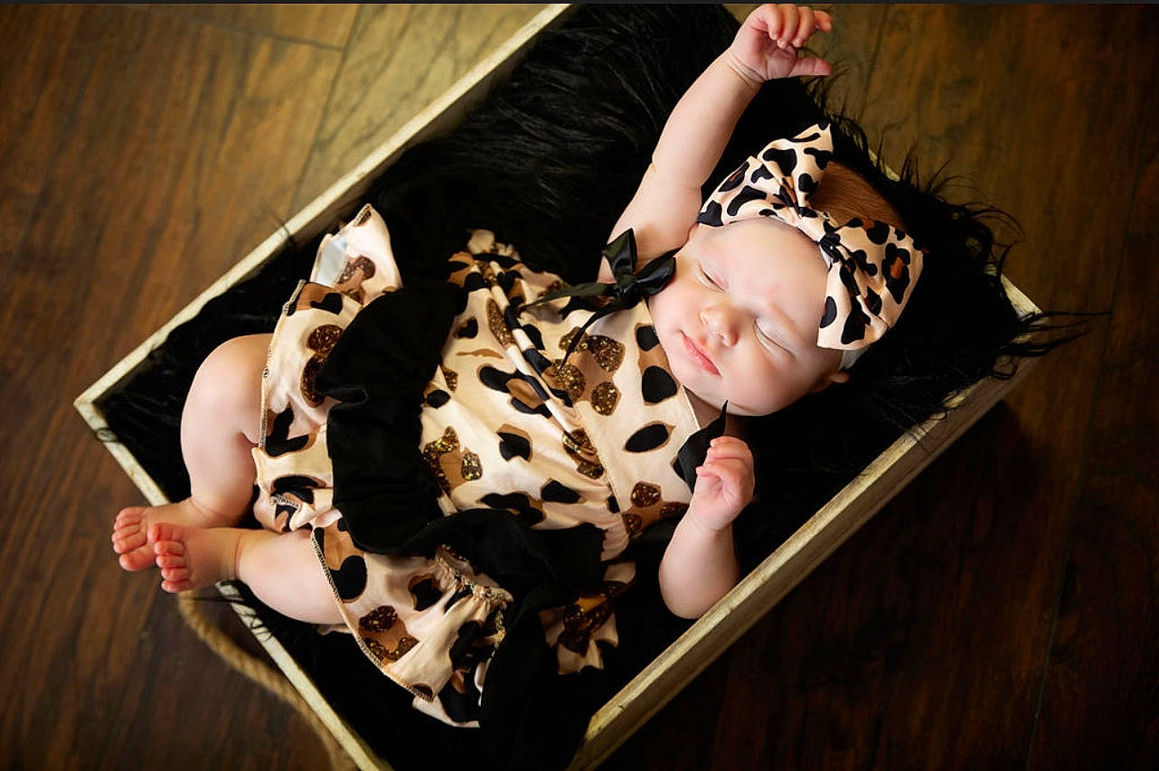 Addilynn joined the competition — help win amazing prizes! baby, baby_toddler_clothing, child, comfort, flash_photography, flesh, fun, headwear, pattern, person, room, sitting, thigh, toddler, visual_arts, wood