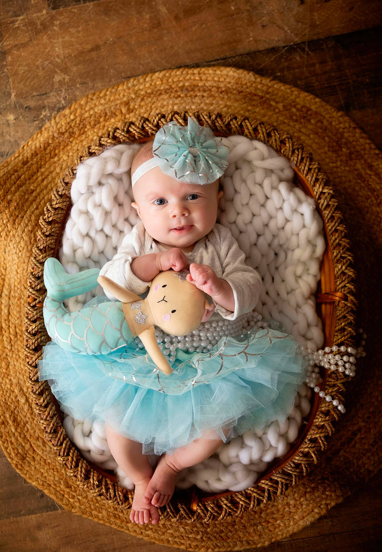 Addilynn joined the competition — help win amazing prizes! aqua, azure, baby, baby_products, baby_toddler_clothing, basket, child, embellishment, eye, fashion_accessory, head, headpiece, headwear, jewellery, pattern, person, pink, sitting, skin, textile