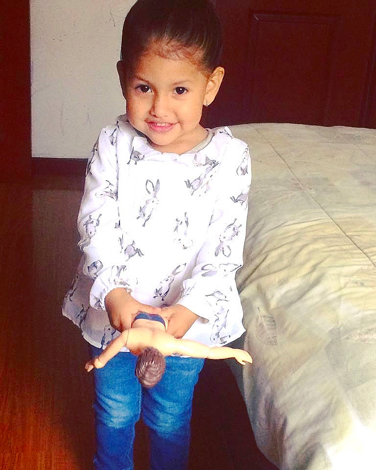 Barbara is registered to the contest to win money with this photo: arm, boy, child, clothing, cool, day, girl, joy, outerwear, person, product, shoulder, skin, sleeve, standing, sweater, t_shirt, textile, toddler, top