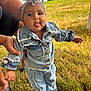 baby, camper_van, casual, child, cute, denim_jacket, denim_pants, fashion, flower_headband, footwear, grass, hand, happy, holding, nature, outdoor, person, playing, summer, tongue_out