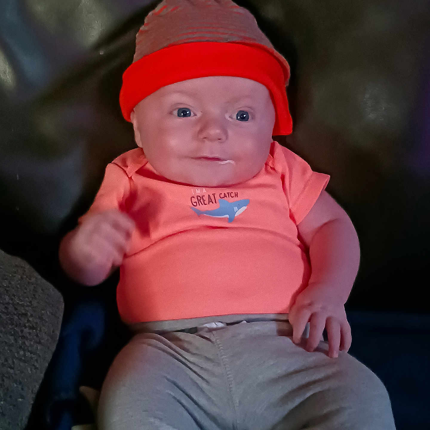 Jaxson Wade Stubbs is registered to the contest to win money with this photo: applique, baby, baseballcap, beanie, bodypart, bonnet, cap, clothing, couch, face, finger, fleece, frown, furniture, hand, happy, hat, head, hood, jeans