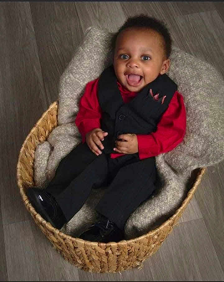 Korean Bowers joined the competition — help win amazing prizes! baby, toddler, smiling, basket, blanket, clothing, red_shirt, black_vest, black_pants, footwear, floor, happy, portrait, indoors, child, cute, sitting, expression, person, cozy