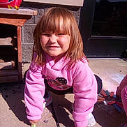 Serenity joined the competition — help win amazing prizes! child, pink_hoodie, sidewalk, chalk, outdoor, smile, sunlight, play, drawing, concrete, casual_clothing, happy, girl, young, crouching, daylight, fun, colorful, toy, recess
