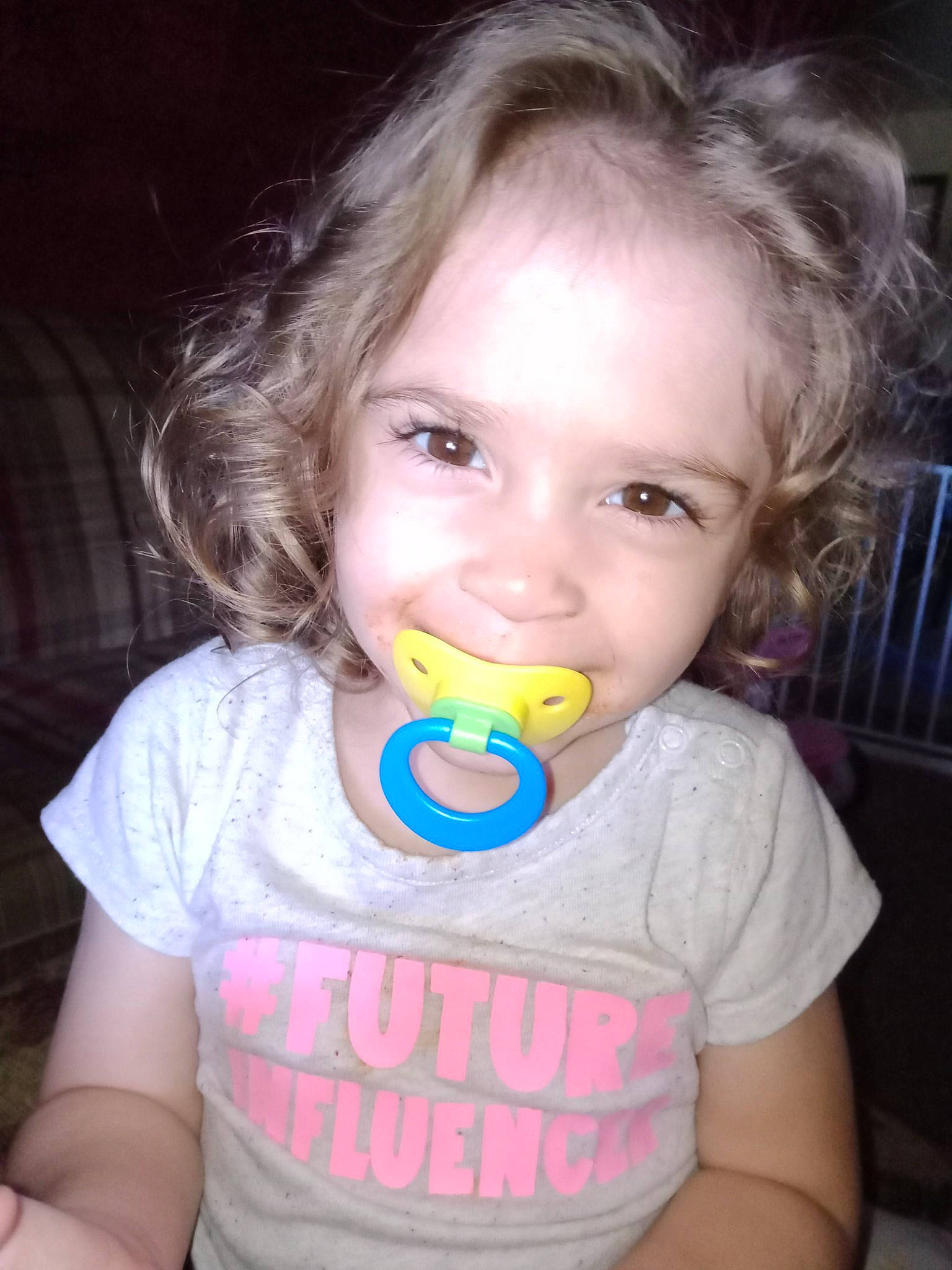 Raina is registered to the contest to win money with this photo: arm, baby_toddler_clothing, cheek, clothing, dress, eyelash, fun, hair, happy, iris, joy, lip, mouth, nose, organ, person, pink, skin, sleeve, smile