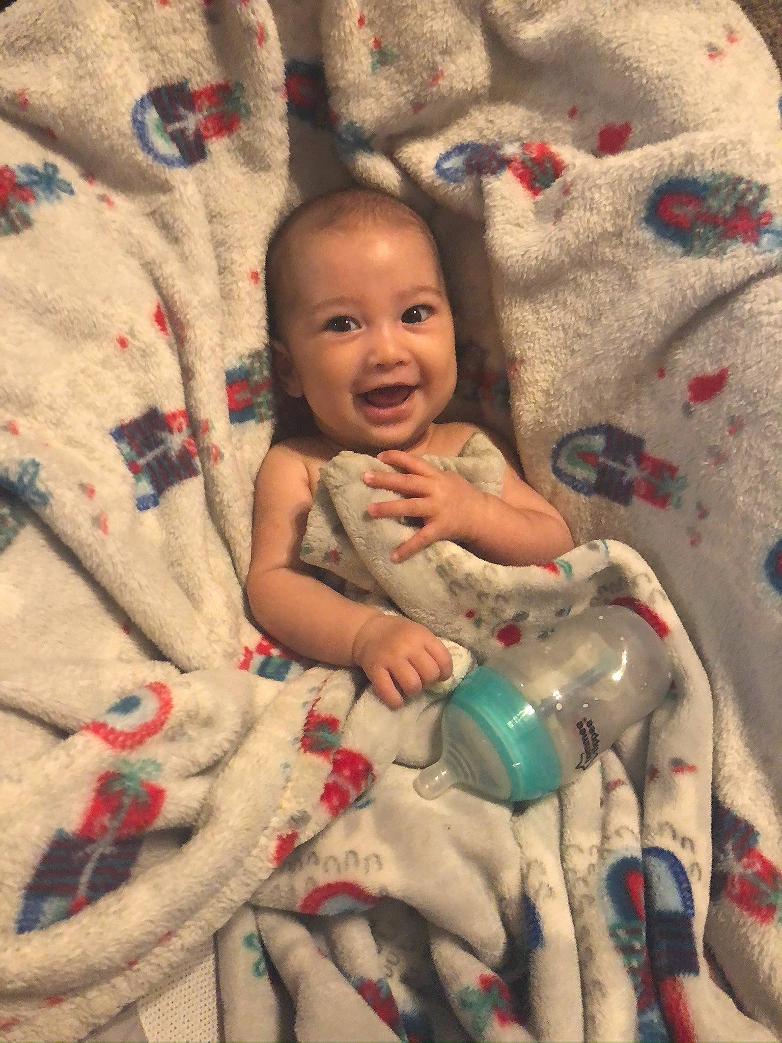 Cecelia joined the competition — help win amazing prizes! baby, blanket, cheek, child, linens, person, play, quilt, skin, smile, textile, toddler