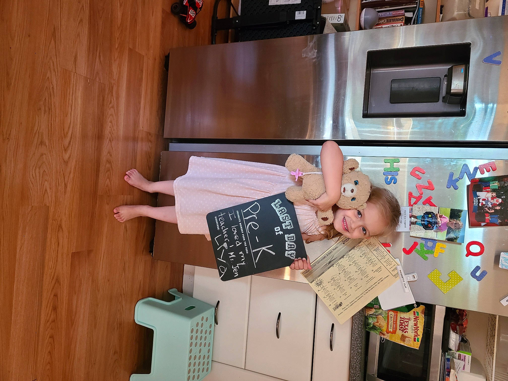 Liya joined the competition — help win amazing prizes! cabinetry, child, electronic_device, flooring, fun, hardwood, home_appliance, house, joy, kitchen, kitchen_appliance, machine, major_appliance, microwave_oven, person, play, refrigerator, room, tableware, toddler