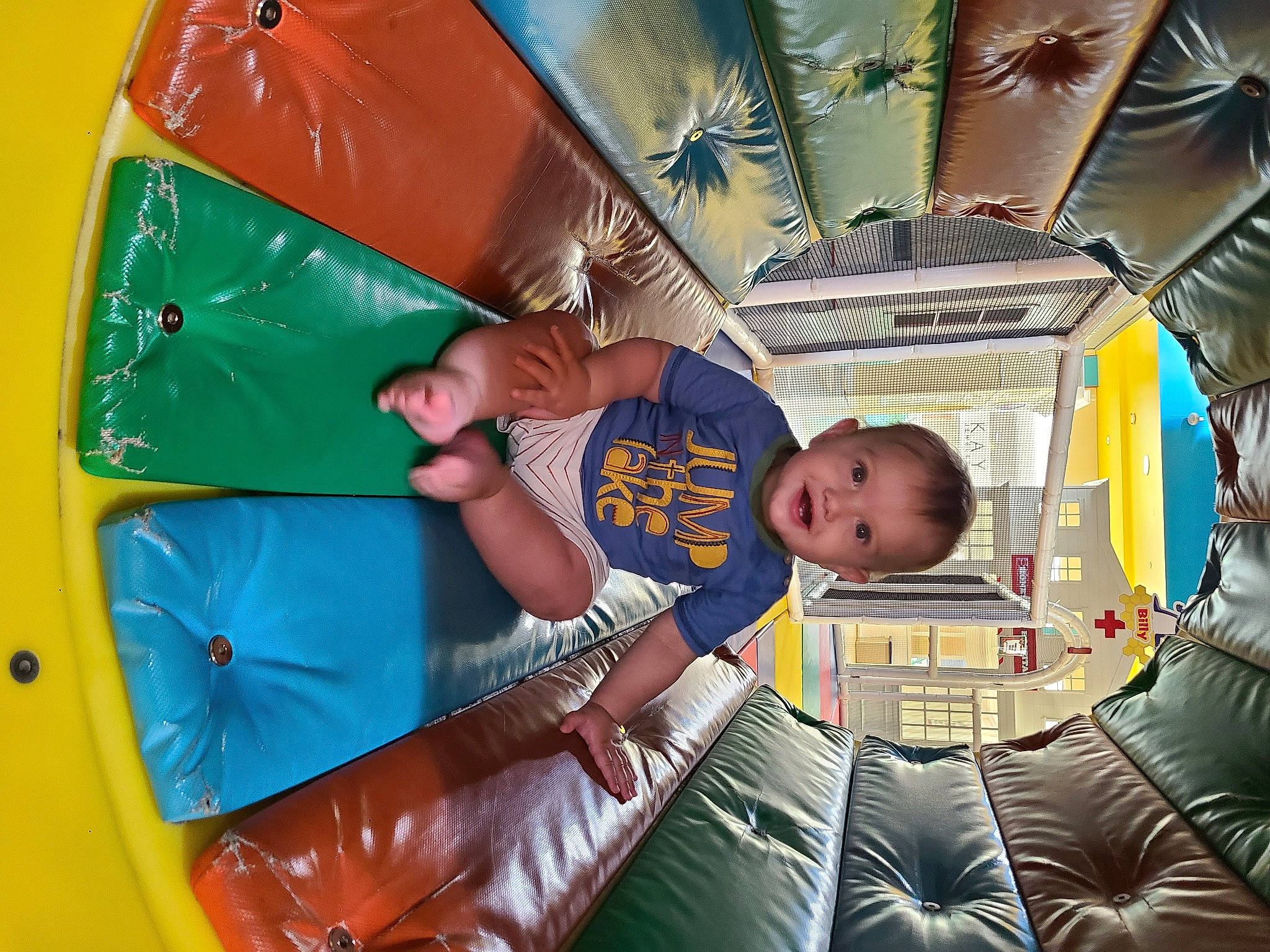 Samuel joined the competition — help win amazing prizes! bounce_house, child, comfort, couch, fun, green, happy, human, inflatable, leisure, outdoor_play_equipment, person, play, recreation, sitting, smile, summer, t_shirt, textile, toddler