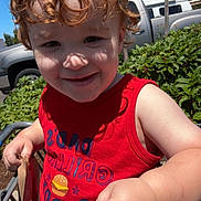 Jesiah joined the competition — help win amazing prizes! toddler, child, curly_hair, shopping_cart, red_tank_top, outdoor, sunny_day, greenery, car_keys, smiling, face, hand, clothing, casual, blue_sky, vehicle, plant, shadow, holding, cute