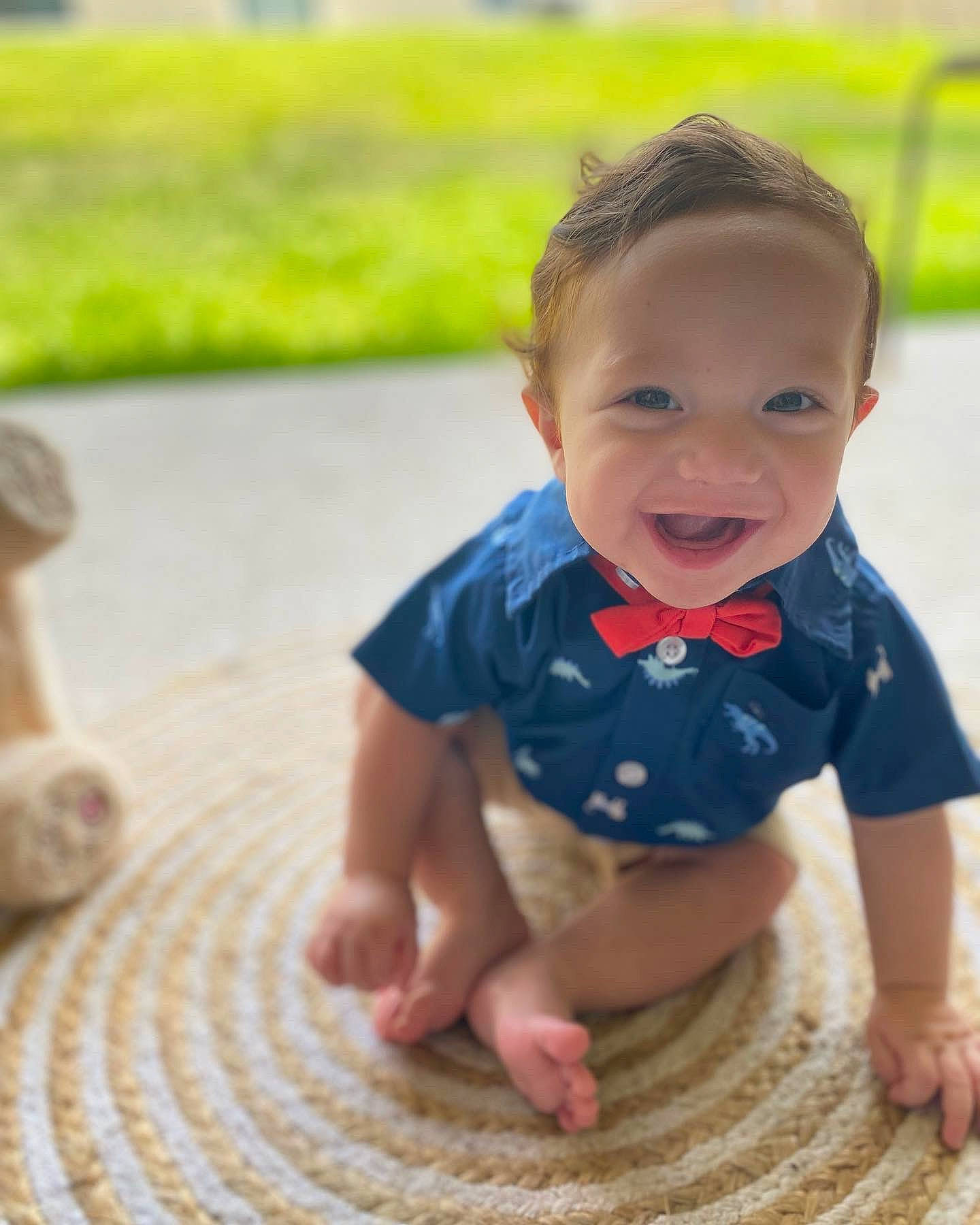 Thiago joined the competition — help win amazing prizes! baby, baby_toddler_clothing, eye, face, finger, floor, flooring, grass, hand, happy, human_body, leg, people_in_nature, person, plant, product, skin, sleeve, smile, toddler