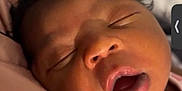 Marlaya is registered to the contest to win money with this photo: baby, calm, child, close_up, cute, expression, face, head, human, indoors, infant, mouth_open, newborn, peaceful, pink, portrait, resting, skin, sleeping, soft