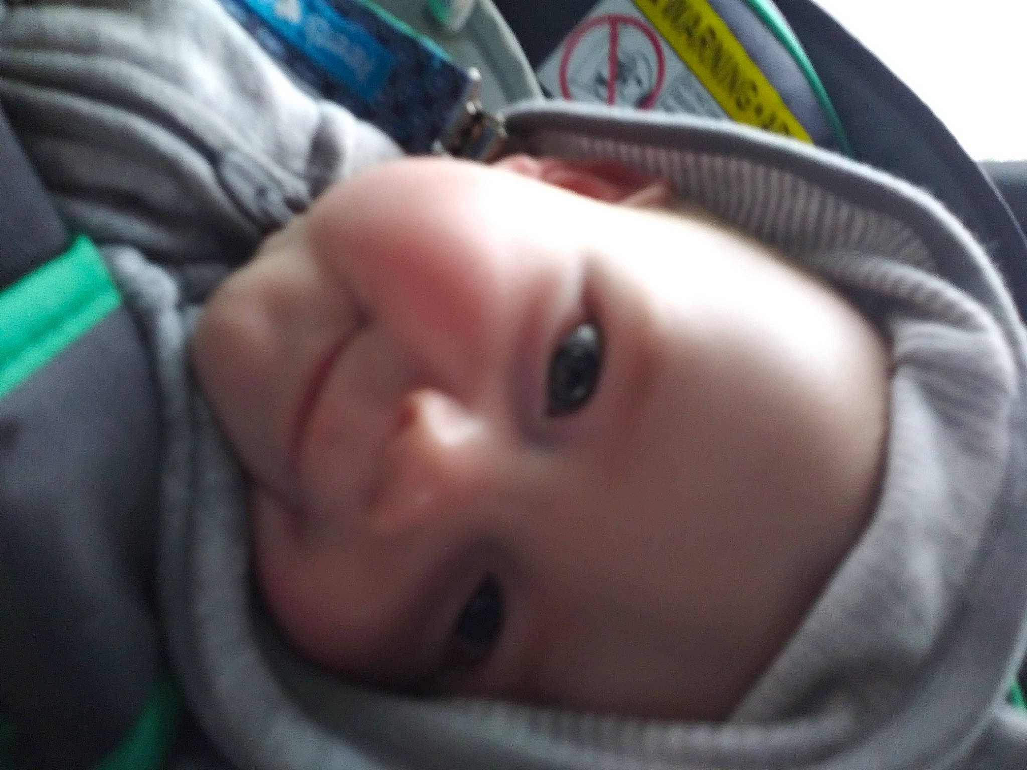 Arrow is registered to the contest to win money with this photo: baby, cheek, child, chin, close_up, eye, eyebrow, face, facial_expression, finger, forehead, head, headwear, joy, lip, mouth, nose, organ, person, product