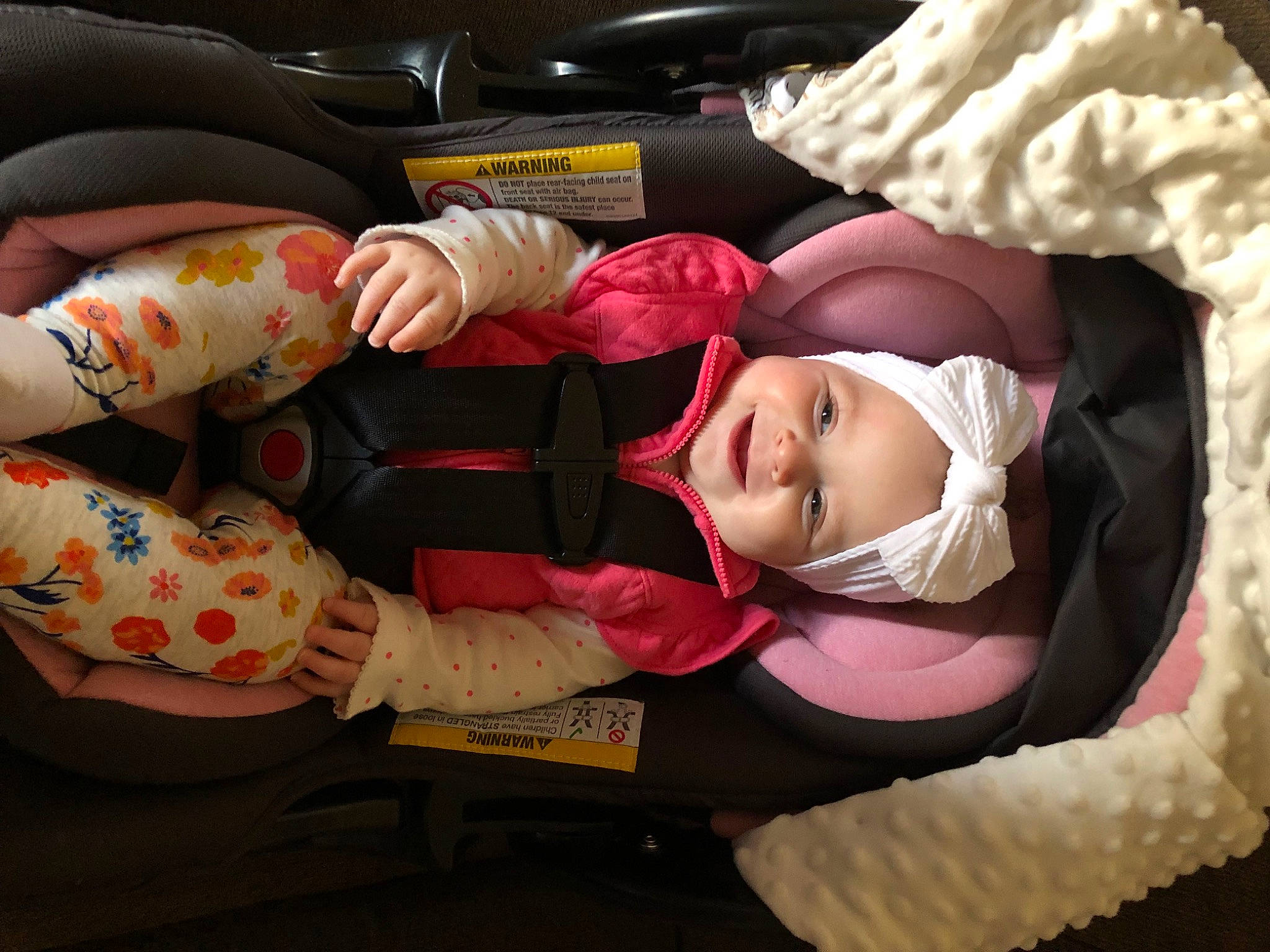 Maleah joined the competition — help win amazing prizes! baby, baby_carriage, baby_in_car_seat, baby_products, baby_safety, baby_sleeping, baby_toddler_clothing, car_seat, carmine, child, comfort, headwear, lap, linens, nap, person, sitting, sleep, toddler, tree