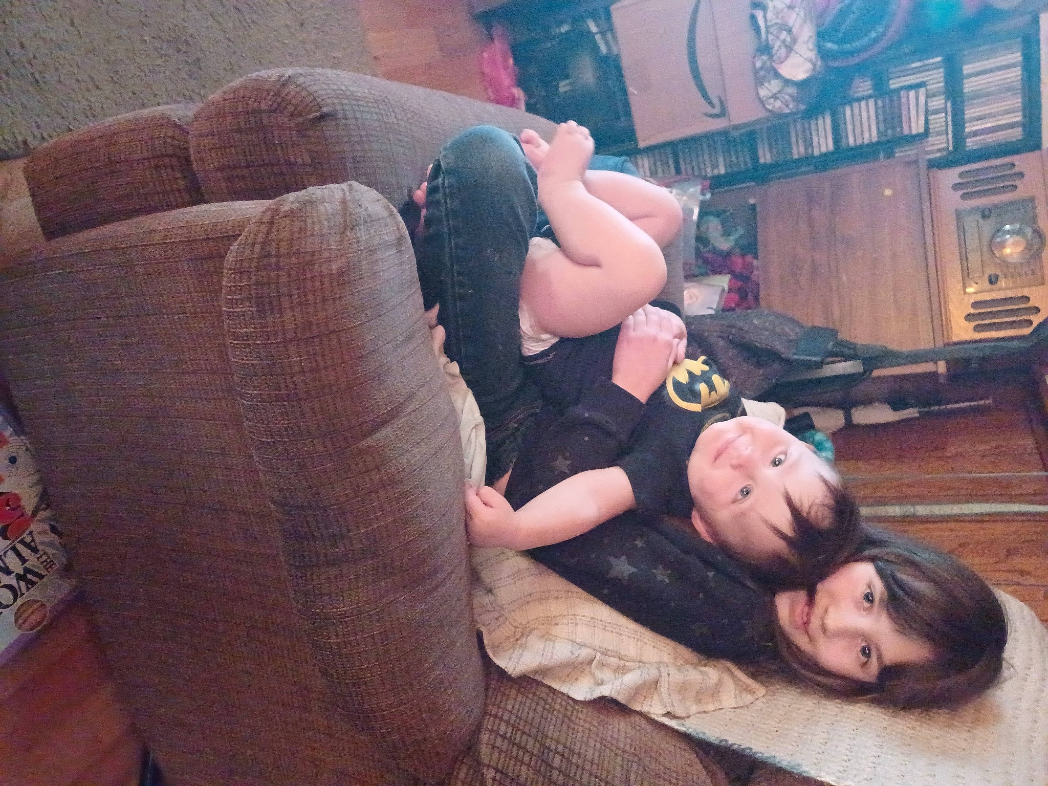 Dani joined the competition — help win amazing prizes! black_hair, comfort, cool, couch, flash_photography, flooring, hair, happy, human_body, human_leg, interaction, joint, joy, knee, lap, leg, leisure, living_room, mouth, person