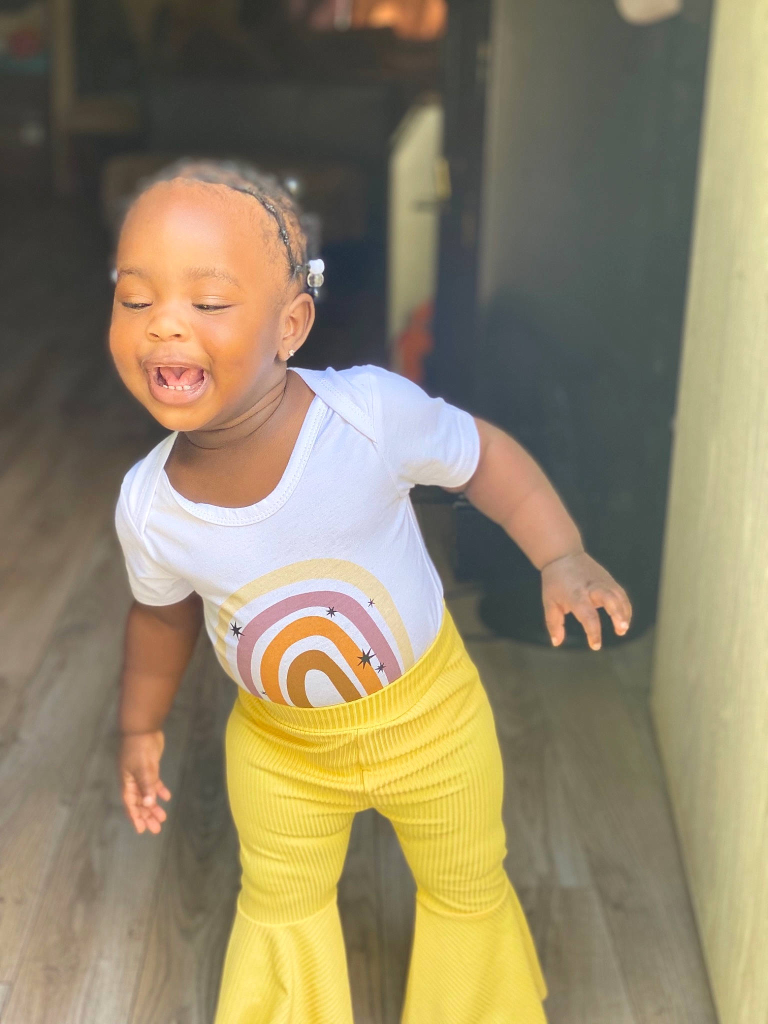 Daylani joined the competition — help win amazing prizes! active_pants, baby_toddler_clothing, cheek, child, floor, flooring, fun, hand, happy, human_leg, neck, person, skin, sleeve, smile, sportswear, t_shirt, thigh, toddler, trunk