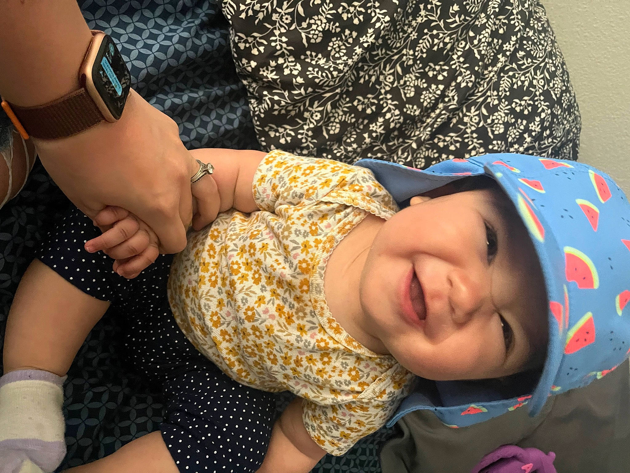 Mckinley is registered to the contest to win money with this photo: arm, black_hair, cool, elbow, eyewear, finger, gesture, hairstyle, happy, headwear, joint, knee, nail, person, sleeve, smile, sunglasses, textile, thigh, toddler
