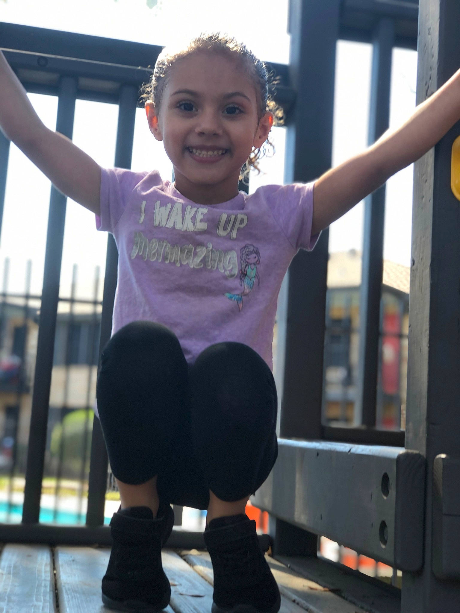 Attianna is registered to the contest to win money with this photo: child, city, electric_blue, finger, fun, happy, joy, leg, leisure, magenta, person, playground, recreation, shorts, sleeve, smile, sportswear, standing, t_shirt, thigh