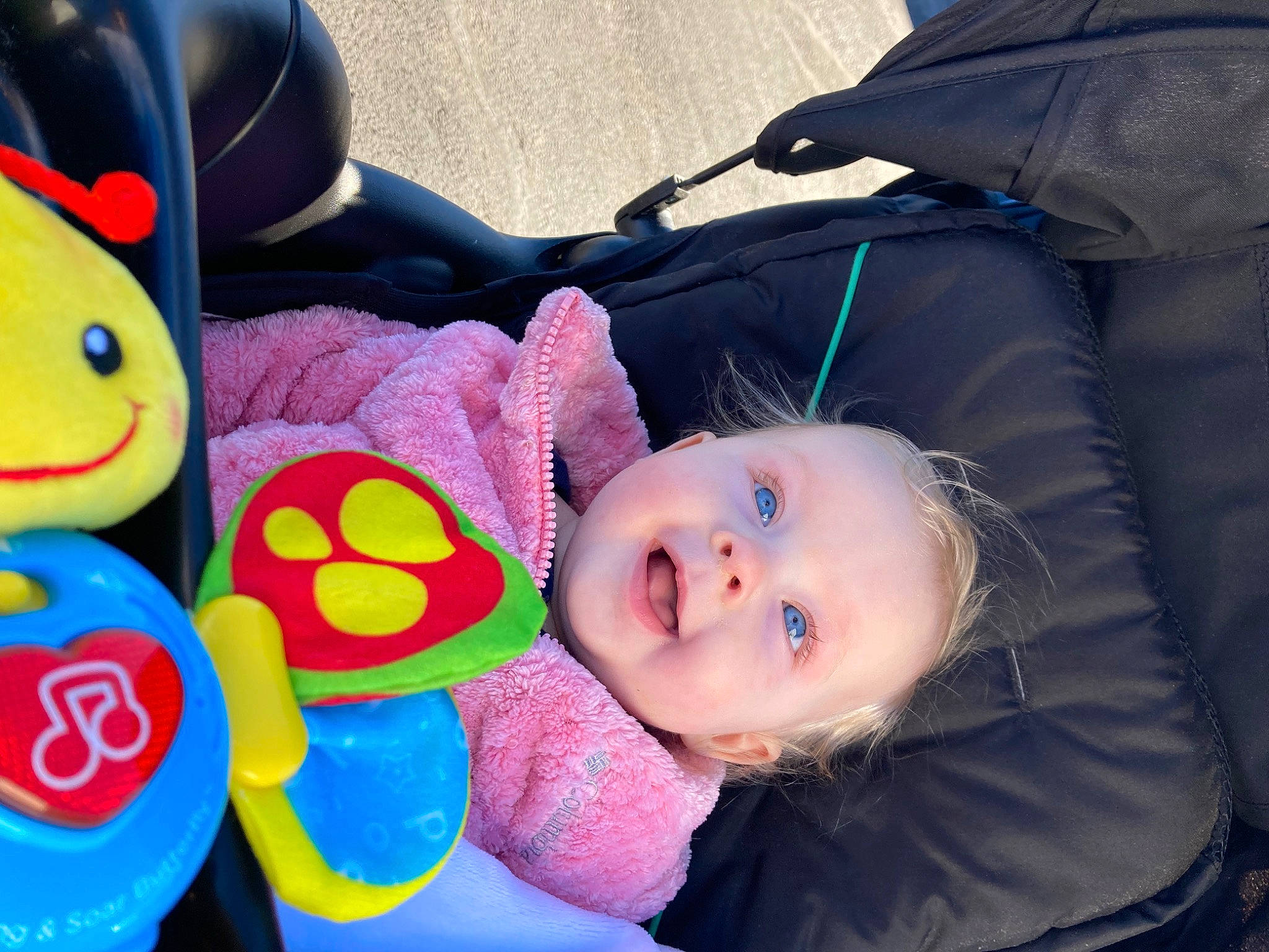 Avianna is registered to the contest to win money with this photo: baby, baby_playing_with_toys, baby_products, baby_toddler_clothing, baby_toys, cheek, child, electric_blue, fun, grass, happy, leisure, people, person, play, sitting, smile, stuffed_toy, toddler, toy