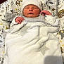 baby, newborn, blanket, hat, sleeping, infant, bed, pillow, soft, cozy, child, cute, peaceful, rest, indoors, warm, hands, face, wrapped, animal_print