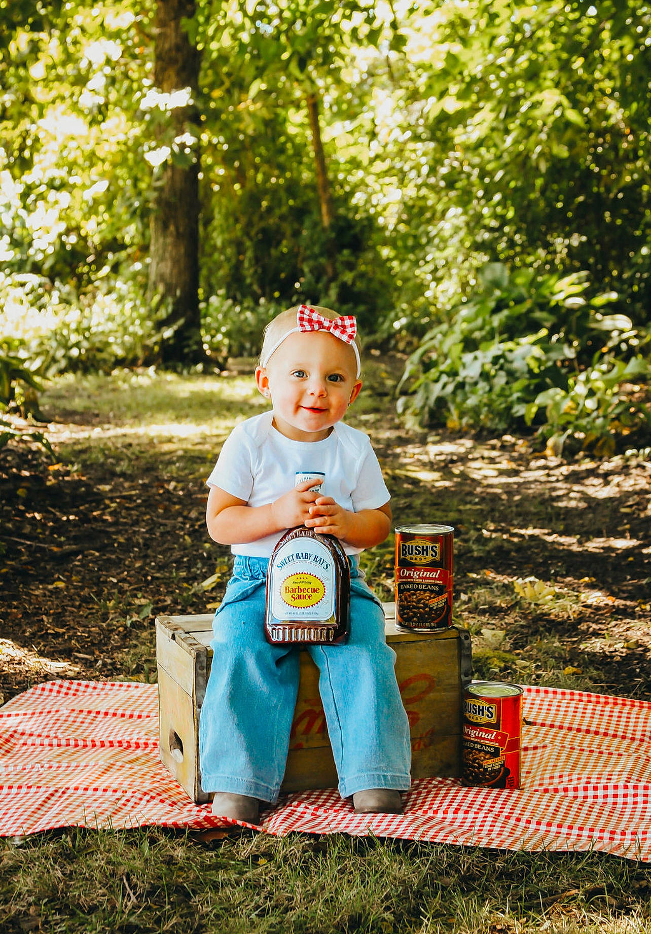 Oaklee is registered to the contest to win money with this photo: baby, baby_toddler_clothing, chair, child, fun, garden, grass, happy, headwear, joy, leisure, outdoor_furniture, people_in_nature, person, plant, play, portrait_photography, recreation, sitting, smile