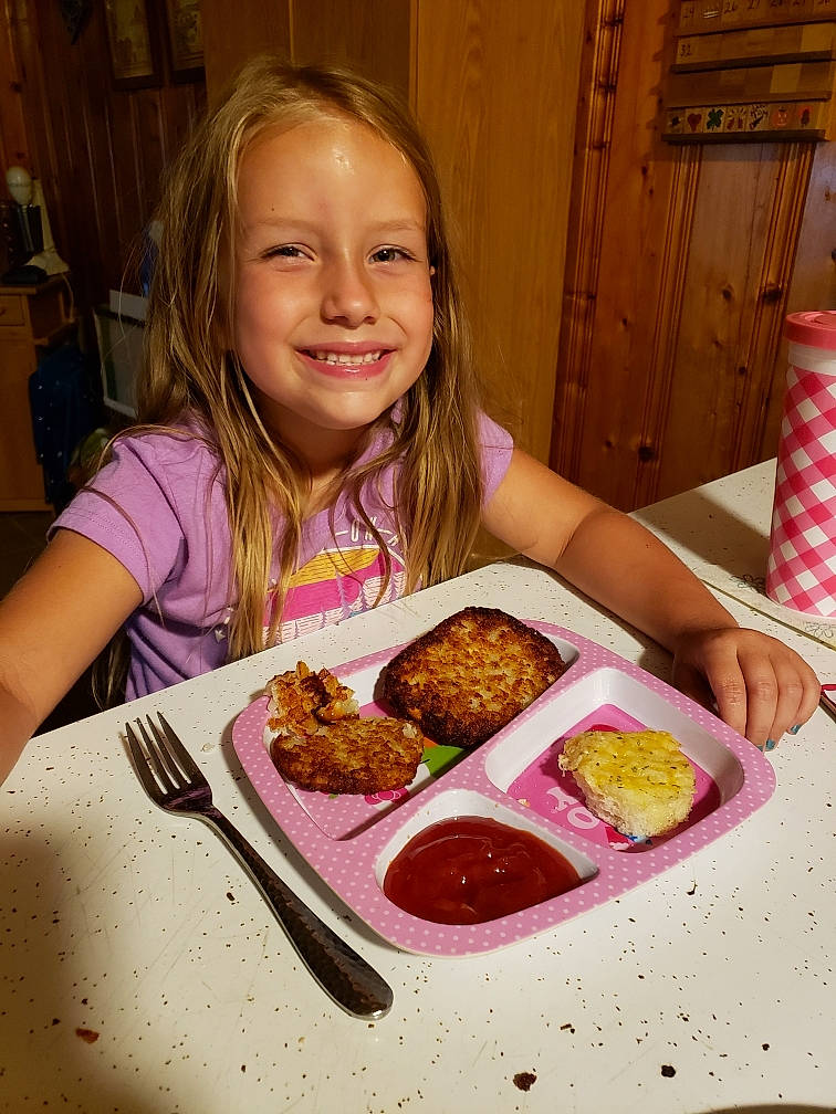 Kirsten is registered to the contest to win money with this photo: baked_goods, baking, cabinetry, child, comfort_food, cooking, cuisine, dessert, dish, finger_food, food, food_craving, ingredient, joy, junk_food, person, plate, recipe, smile, sweetness