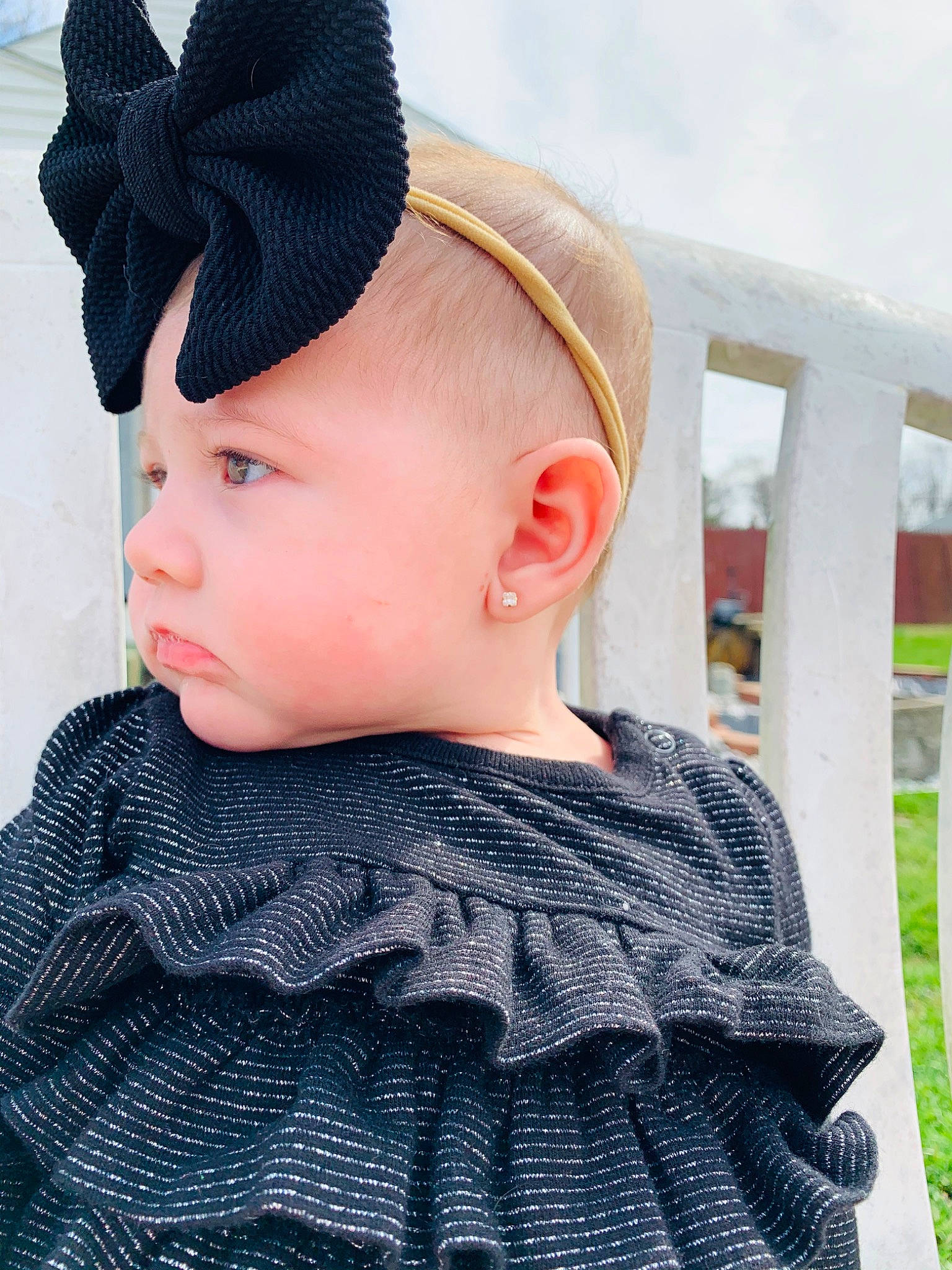 Tayler is registered to the contest to win money with this photo: baby, beanie, cap, child, clothing, costume_accessory, design, ear, fashion_accessory, hair_accessory, hat, head, headband, headgear, headwear, neck, pattern, person, textile, toddler