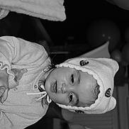 Lya a rejoint le concours — aidez-le/la à gagner de superbes lots ! baby, balloons, black_and_white, child, clothing, cozy, cute, expression, face, furniture, hat, headwear, home, indoor, knit_hat, pacifier, person, portrait, toddler, young_child