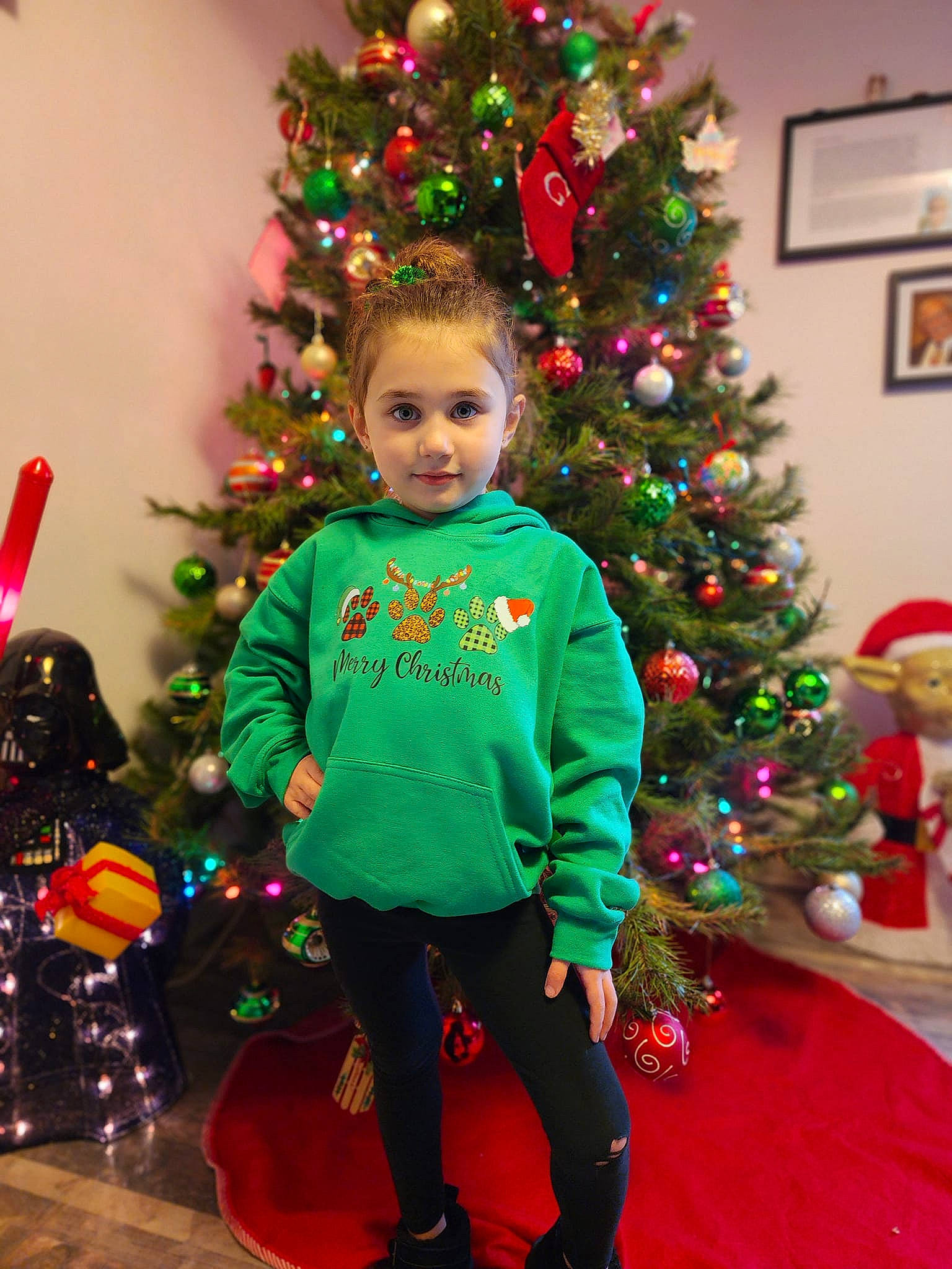 Natalia joined the competition — help win amazing prizes! christmas, christmas_decoration, christmas_eve, christmas_ornament, christmas_tree, event, evergreen, fun, green, holiday, holiday_ornament, joy, leaf, ornament, person, plant, red, toddler, tradition, tree