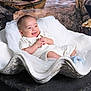 Austin is registered to the contest to win money with this photo: baby, background, blue_socks, child, clam_shell, cute, decor, fabric, happy, infant, pirate_theme, portrait, pose, prop, seated, smiling, soft_texture, studio_lighting, treasure_chest, white_clothing