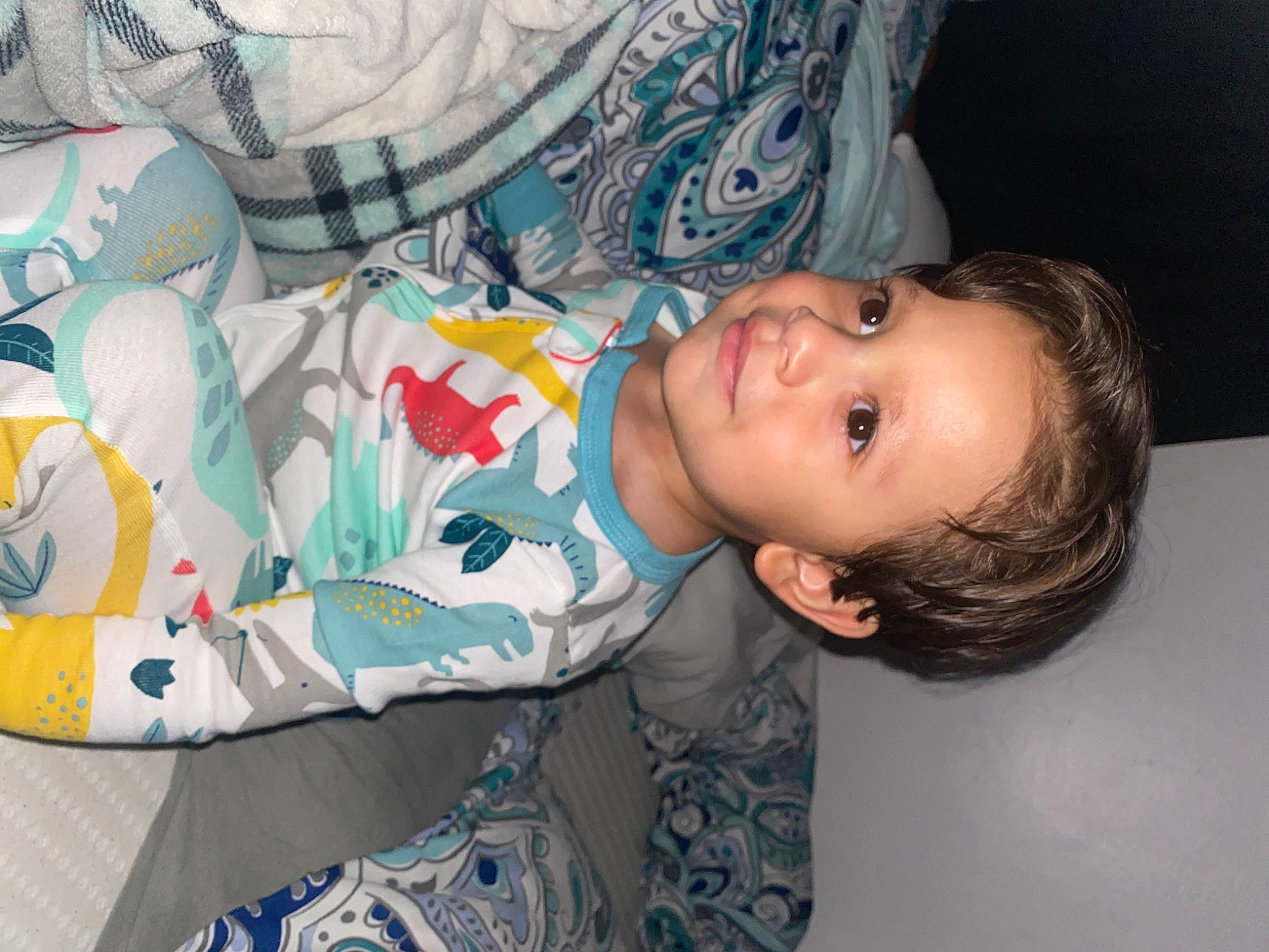 Kylo joined the competition — help win amazing prizes! baby, baby_toddler_clothing, cheek, child, comfort, eye, face, fun, happy, head, linens, mouth, pattern, person, room, sitting, skin, sleeve, smile, t_shirt