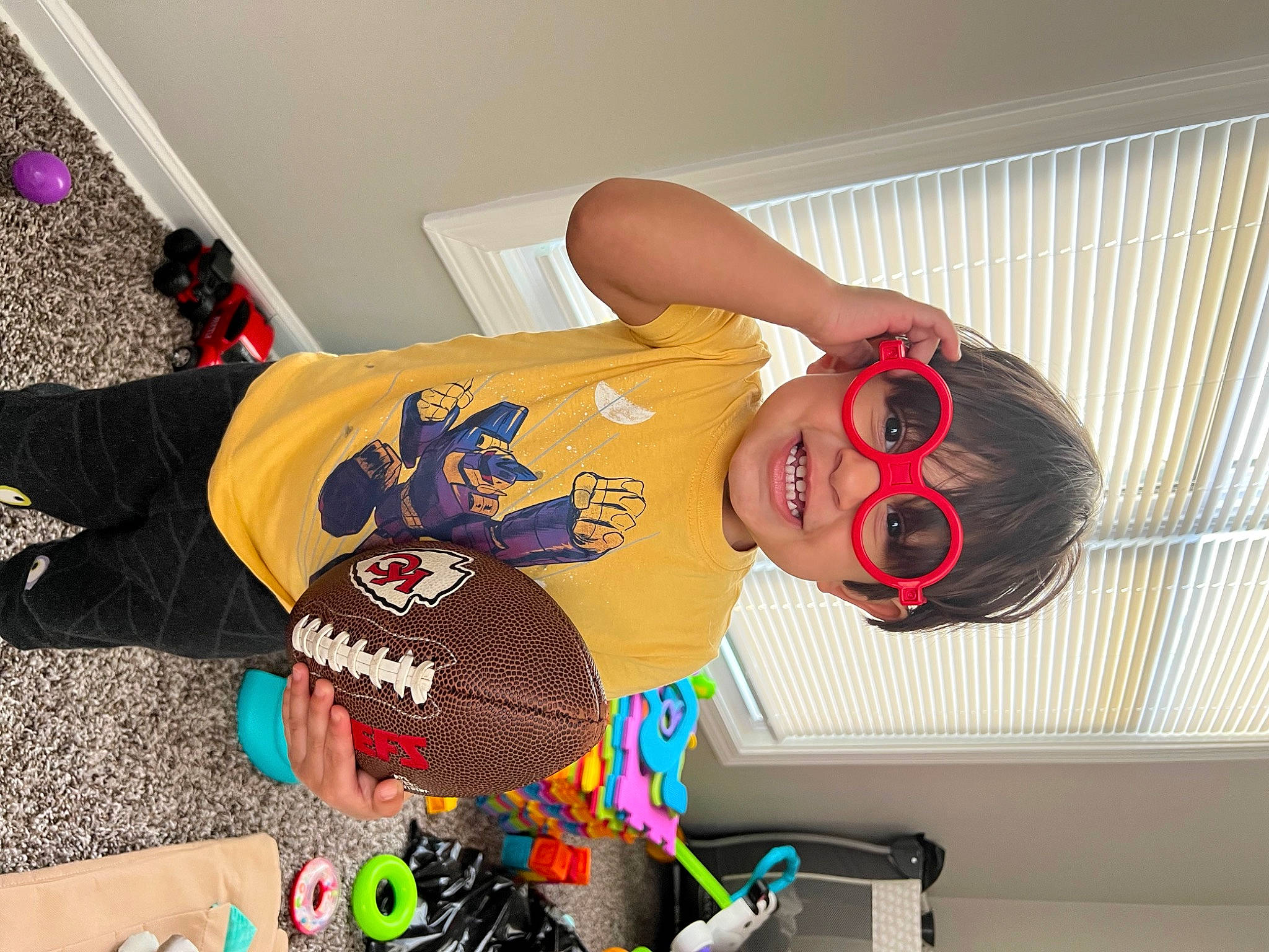 Kylo joined the competition — help win amazing prizes! costume, design, eyewear, fashion_design, fictional_character, flooring, fun, happy, headgear, human_leg, orange, pattern, person, room, sportswear, t_shirt, textile, thigh, toddler, toy