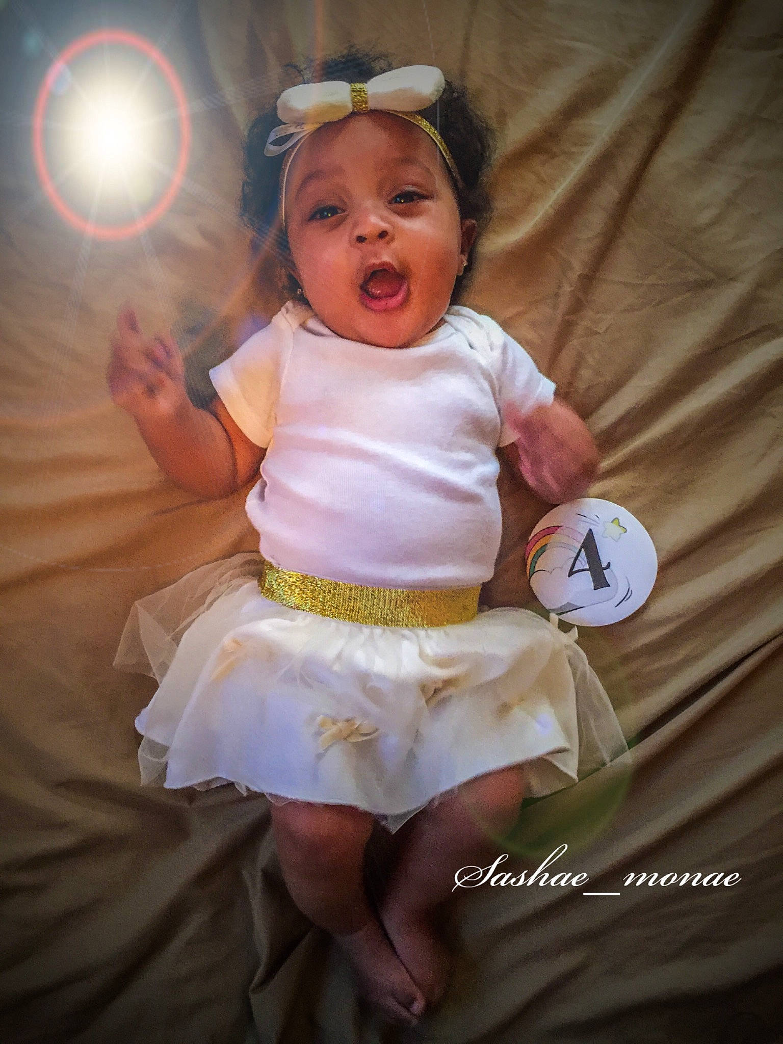 Sashae is registered to the contest to win money with this photo: baby, baby_products, baby_toddler_clothing, child, child_model, costume, fun, hair_accessory, happy, person, photo_shoot, photography, pink, product, skin, smile, surprise, toddler