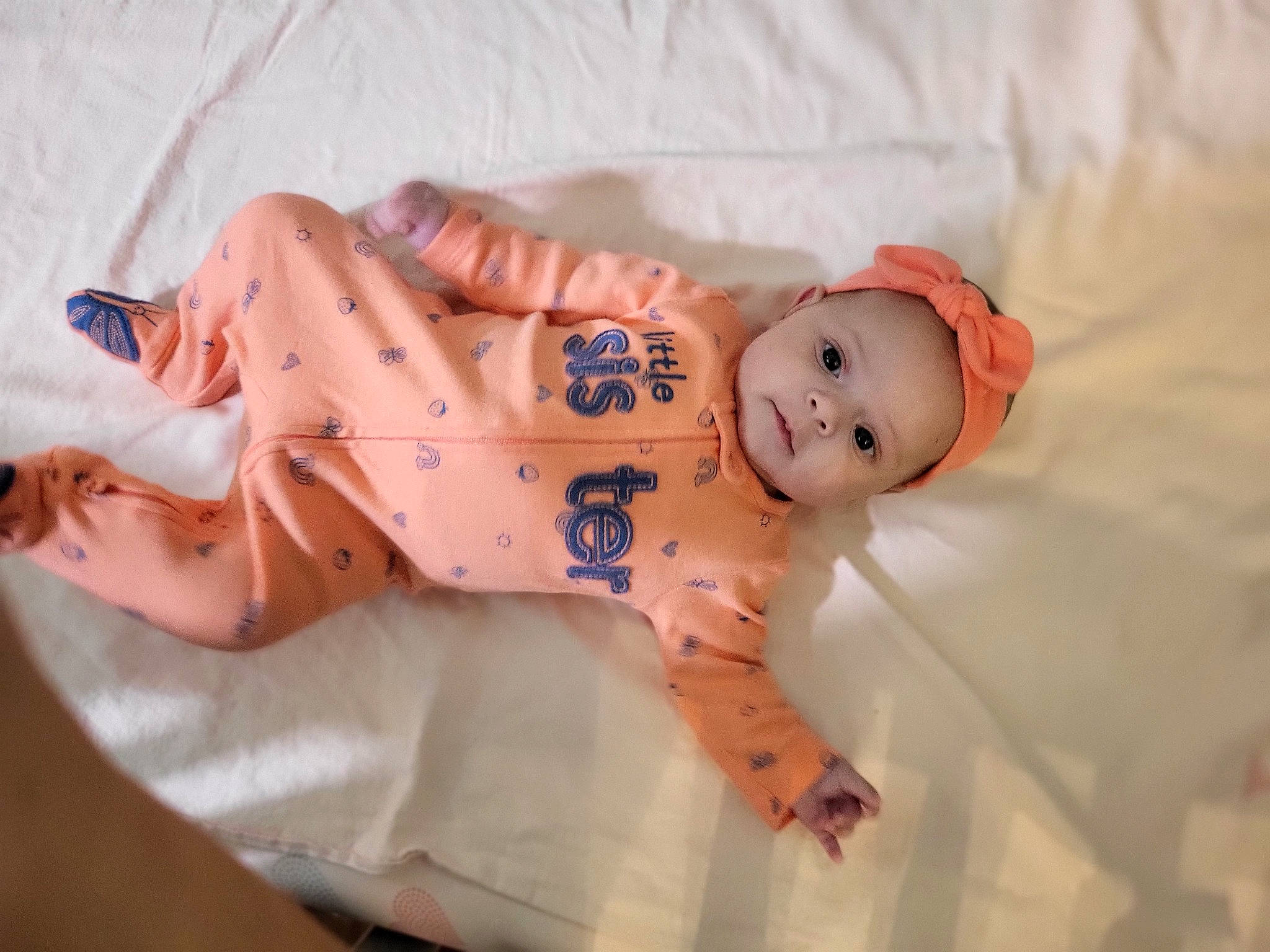 Kira joined the competition — help win amazing prizes! baby, baby_products, baby_toddler_clothing, child, comfort, dress, eye, fur, happy, hat, headwear, linens, pattern, peach, person, pink, portrait_photography, skin, sleeve, textile